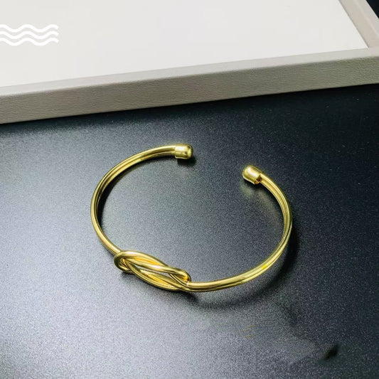 Bracciale ottone a nodo