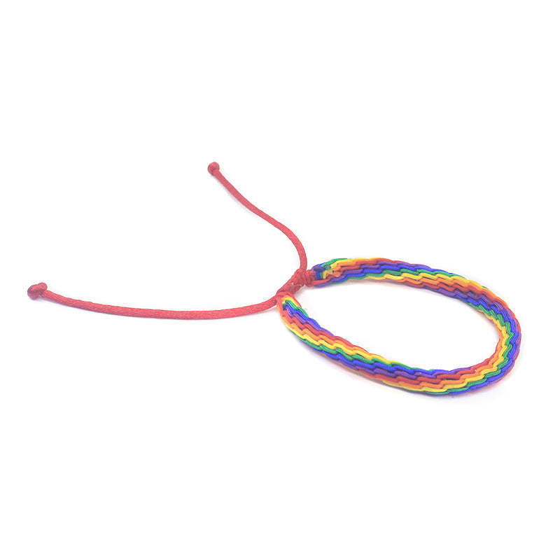 Bracciale intrecciato arcobaleno da mano