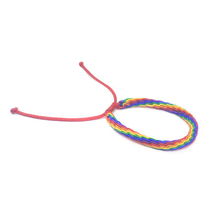 Bracciale intrecciato arcobaleno da mano
