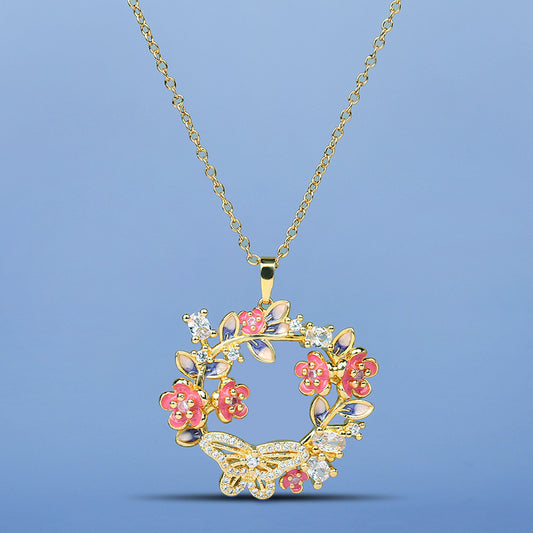 Collana farfalla e fiori smaltata