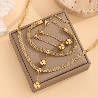 Collana sfere dorate con nappa