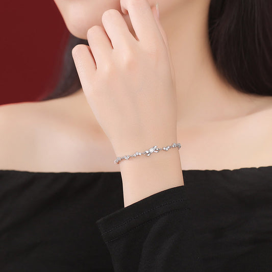 Bracciale farfalla intrecciato diamantato