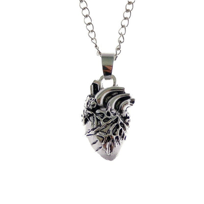 Collana teschio e cuore anatomico