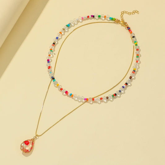 Collana fiore secco resina a goccia