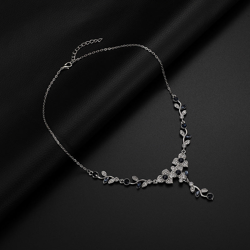 Collana e orecchini fiori e viti