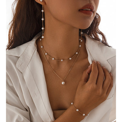 Collana perle e croce