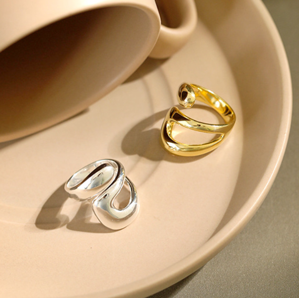 Anello croce geometrica a goccia