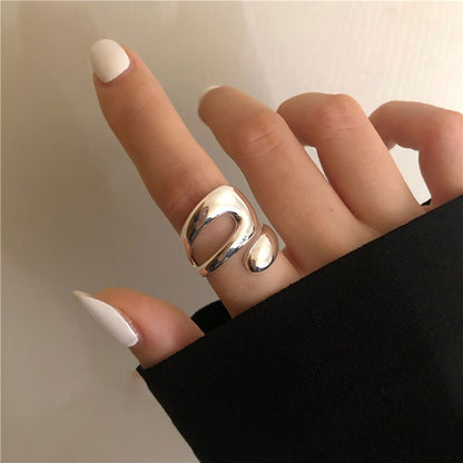 Anello croce geometrica a goccia