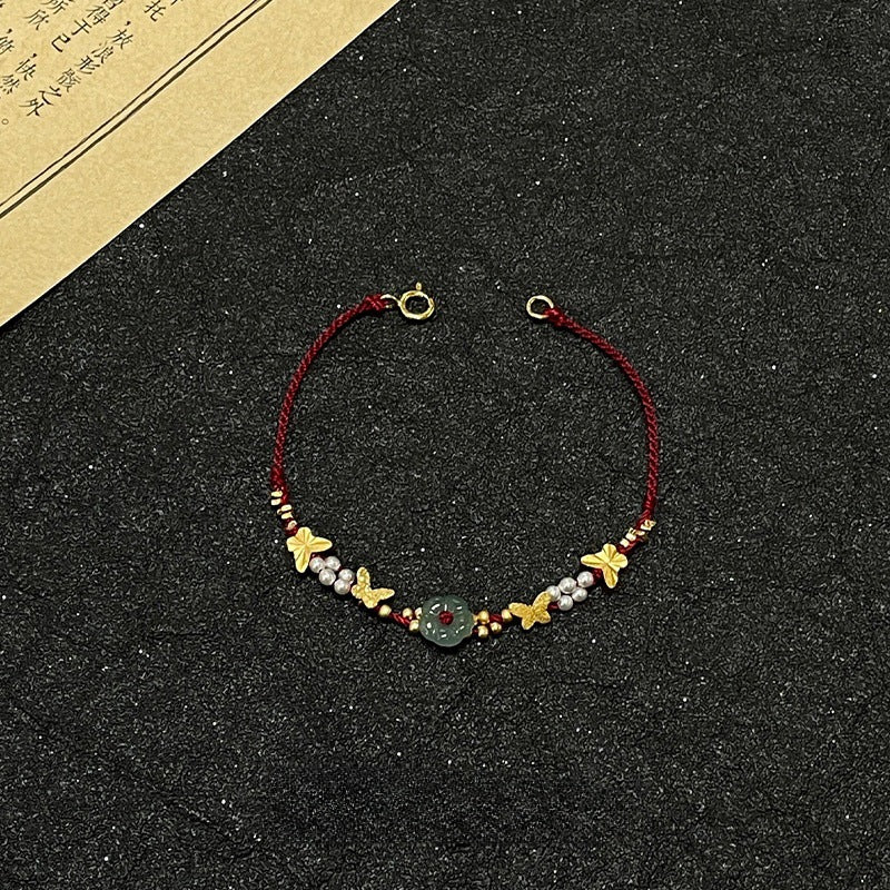 Bracciale farfalla e perle
