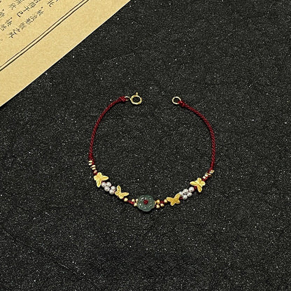 Bracciale farfalla e perle