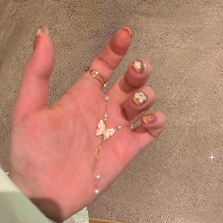 Collana farfalla e perle da donna