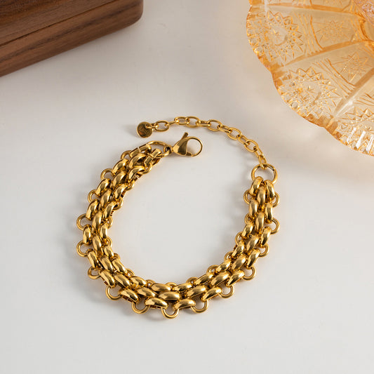 Braccialetto titanio geometrico oro 18K