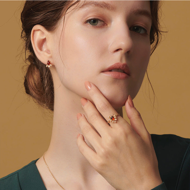 Anello argento dorato con fiore e ambra