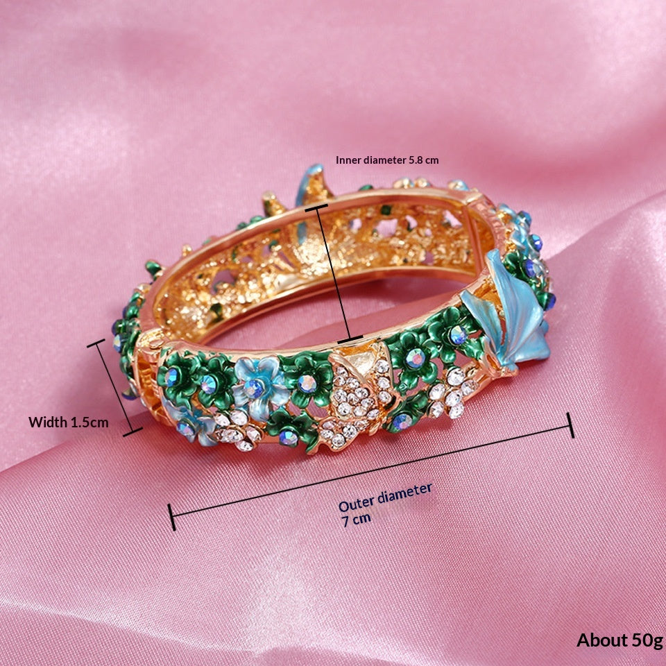 Bracciale farfalla e fiore aperto