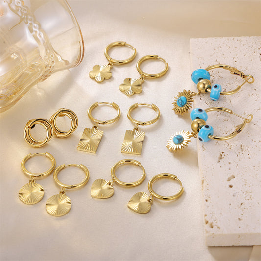 Orecchini geometrici oro acciaio