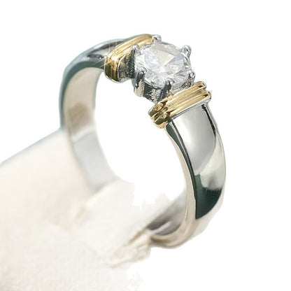 Anello bicolore zirconi tondi