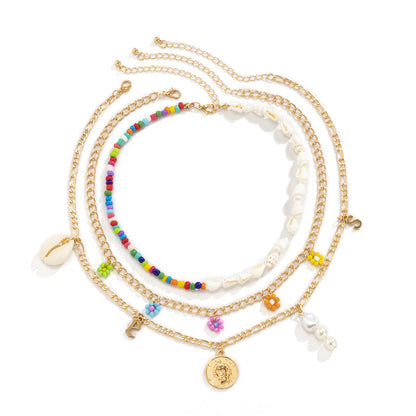 Collana fiori e conchiglie