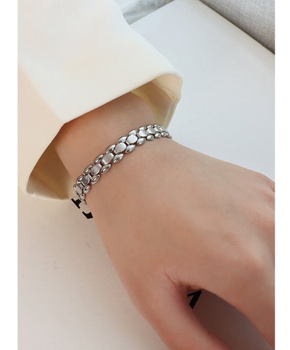 Bracciale titanio oro 18K