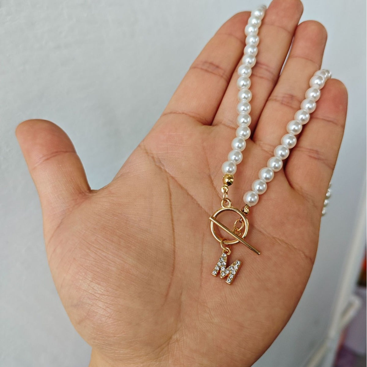 Collana perle con lettere