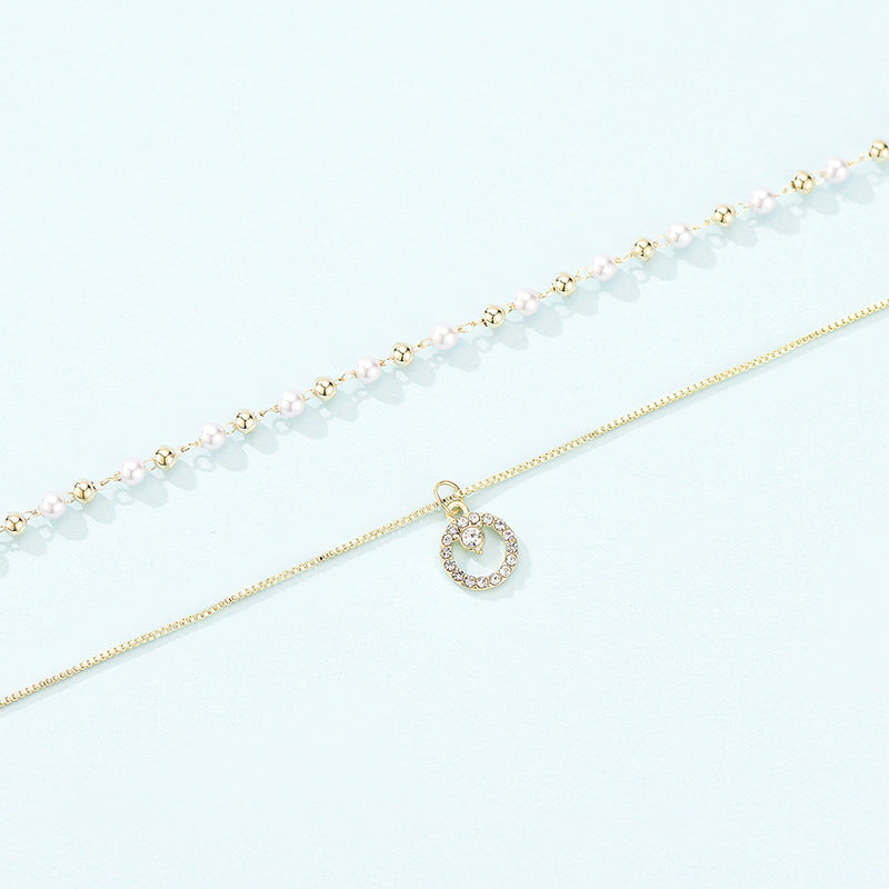 Collana anello doppia perla