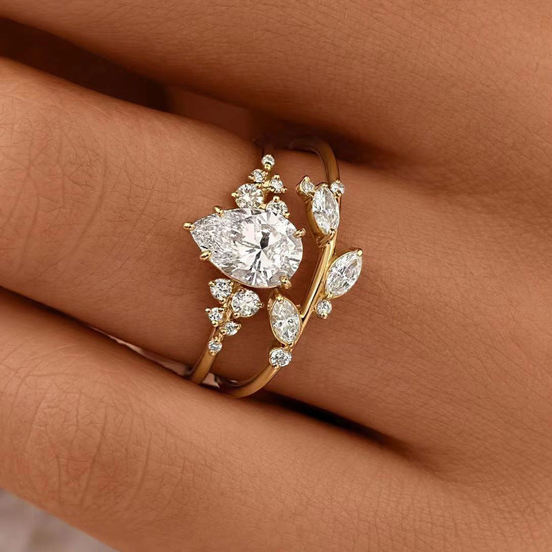 Anello rami e foglie zircone