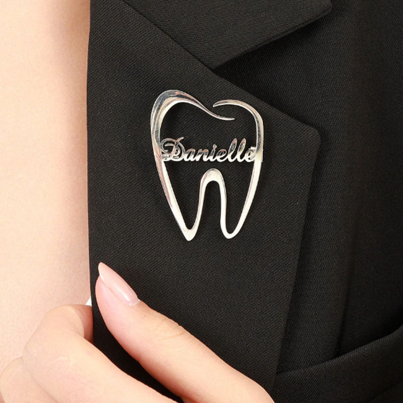 Spilla dente in acciaio inox