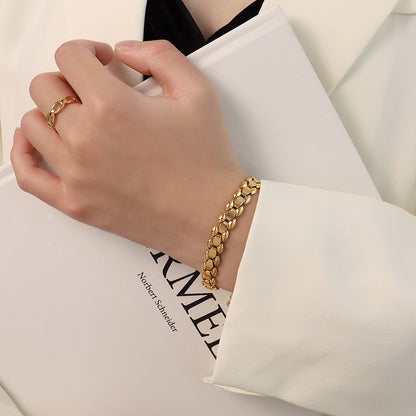 Bracciale titanio oro 18K