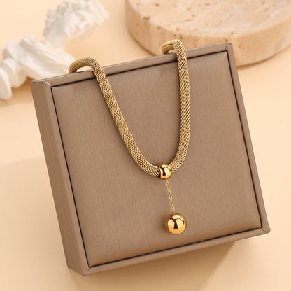 Collana sfere dorate con nappa