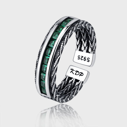 Anello smeraldo e zircone intrecciato