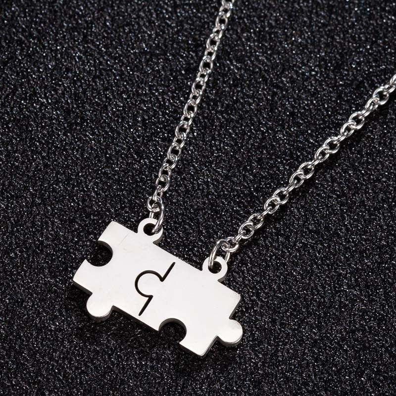 Collana puzzle acciaio