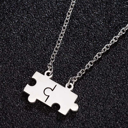 Collana puzzle acciaio